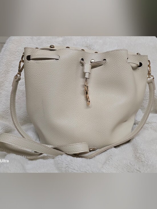 Handbags - Cream Pebbled Leather Drawstring Shoulder Bucket Bag with Gold Accents
